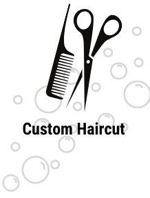 a black and white logo with scissors and comb